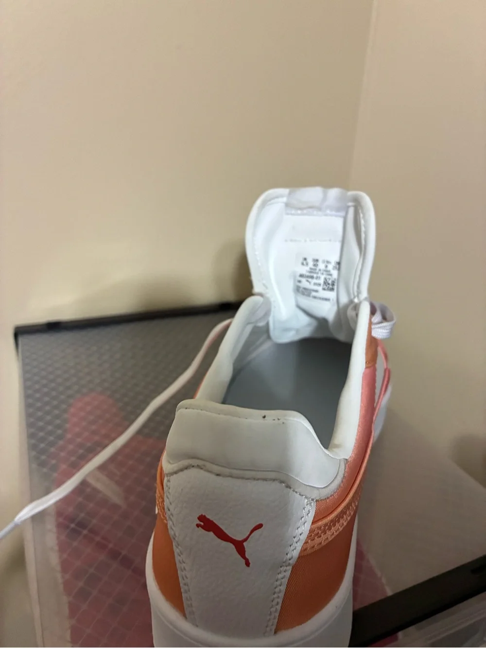 Puma women’s White and Orange Casual Sneakers